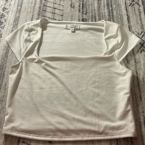 Cute white top, never worn,cute